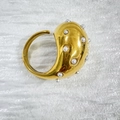 Modern 18K gold plated teardrop open ring with inlaid pearls on a textured background - Gold Pearl