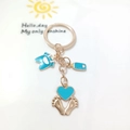 Blue baby onesie and bottle alloy keychain pendants with golden metal baby feet - Style D / Blue