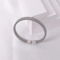 Detailed view of silver mesh textured stainless steel open cuff bracelet with end caps - Steel 2