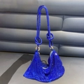 Detailed close-up of blue rhinestone hobo bag featuring a stylish knotted shoulder strap - Standard Size / Blue