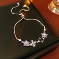 Detail of purple flower zircon bracelet with adjustable slider clasp on black leather - Silver-Purple