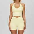 Light yellow yoga set with halter neck V-neck top and high waist knotted shorts - S / Top And Bottom / Creamy Yellow