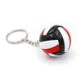 Detailed view of a mini tricolor volleyball keychain with metal ring on white background - Bordeaux Black Red