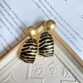 Close-up of geometric gold metal earrings featuring zebra stripe pattern and vintage style - Gold Black Zebra Pattern Metal Geometric Style (139#)