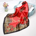 Macro detail of red leopard print satin scarf featuring vintage chain patterns and texture - 90x90cm / Black Red