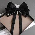 Elegant large black satin bow hair clip with rhinestone butterfly details and long ribbons - Black
