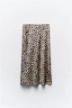 Macro detail of high-quality leopard print pattern on lightweight satin midi skirt - Light Leopard