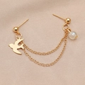 Gold plated zircon chain earrings with bird pendant on silk fabric background - Golden Bird Transparent Beaded Chain (KC Gold DZ-806)