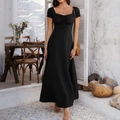 Elegant black puff sleeve dress with square neck and lace-up detail in a vacation setting - S / Black