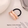 Elastic hair tie featuring a rose gold curved metal accent, size 5.2cm by 2.5cm - Double Layer Arc Rose Gold