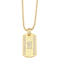 Detailed shot of golden rectangle N pendant necklace with woven texture and crystals - Letter N