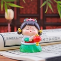 Traditional Chinese girl figurine wearing red and green Hanfu holding a red lantern - 1056-17A Holding Lantern