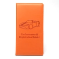Detail of orange faux leather car insurance holder with embossed sports car logo - Orange