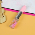 Lipstick shaped liquid sand pen with pink cap and colorful heart sequins in floating water - Deep Pink