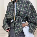 Detail view of green and grey plaid long sleeve shirt with a stylish front waist knot - S / Dark Gray