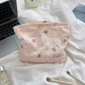 Detailed view of pink quilted fabric cosmetic bag with cute floral and animal patterns - Purple Bowknot Rabbit