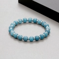 Macro detail of 8mm blue natural stone beads and silver stainless steel spacers on bracelet - Sky Blue Natural Stone (KB183244-TLX)
