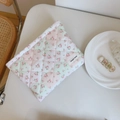 Pink floral quilted cotton cosmetic pouch for makeup and phone storage on white table - Light Green Pink Grid Small Flower