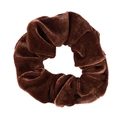 Macro detail of plush dark brown velvet fabric and soft texture on the elastic hair scrunchie - Coffee