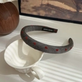 Gray sponge headband with red heart patterns and black handmade label on ceramic cup - Grey-Heart