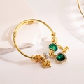 Adjustable gold rope bracelet with green heart gemstone and crown charms for women - Green Heart Zircon