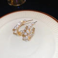 Gold-plated C-shaped earrings featuring white pearls and shimmering clear rhinestones - C-Shape Pearl Rhinestone