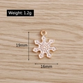 Detailed size view of a 19mm Christmas snowflake pendant with gold edge and white enamel - Enamel Snowflake (YD150)