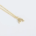 Elegant gold dolphin pendant necklace with white crystal inlay on a delicate chain - Gold Dolphin
