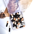 Detail of dual-ended sponge eyeshadow brushes in a clear storage box with peach tips - 4cm Single Head Black Handle Skin White Sponge - 50 Pcs Box