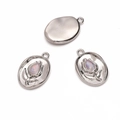 Three silver oval pendants with rose pattern and opal gemstones on white background - Pink Tulip