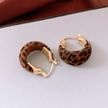 Close-up of vintage leopard print velvet C-shaped hoop earrings with gold hardware - Coffee Leopard