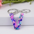 Letter V resin keychain with colorful stone inclusions and silver lobster clasp - Letter V