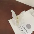 Iridescent butterfly hair claw clip with pearl-like finish and gold metal spring - Milky White