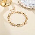 Detail of 18K gold stainless steel bracelet with oval thick links and lobster clasp - Oval Link Style