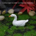 Miniature white resin duck figurine with orange beak and feather texture for gardens - Small Sitting Duck (Bulk)