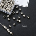 Detalle de cuentas espaciadoras de cobre pulido plateado de 5mm para joyas DIY - Color Oro Blanco 5mm (30 piezas)