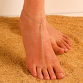 Silver daisy chain foot jewelry with toe ring on beach sand, bohemian vacation style - White K (A-772)