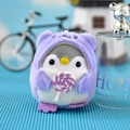 Close-up of cute plush penguin keychain wearing a purple hood and holding a tiny lollipop - 10cm (Bead Chain) / Purple