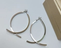 Minimalist silver interlocking hoop earrings with creative polished cross-line design - Creative Cross Lines (Steel 1)