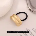 Golden double-layer curved metal hair tie with high-elastic black band, size 5.2x2.5cm - Kc Gold Double Layer