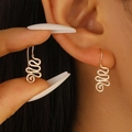 Elegant gold wavy spiral hoop earrings with minimalist geometric line design - Gold