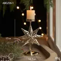 Golden star-shaped metal candle holder with hollow carvings and 17cm height - Eight-pointed Star