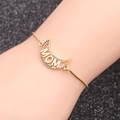 Gold adjustable MOM moon bracelet with colorful zircon stones on a dark background - Gold Box Chain Moon MOM Bracelet