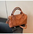 Classic caramel brown leather boston bag with pebble grain texture and top handles - Brown