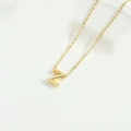 Minimalist gold-polished necklace featuring a delicate capital letter Z pendant - Letter Z