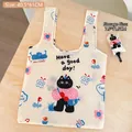 Foldable white shopping bag with black cat print, includes portable storage pouch and hook - Black Cat Illustration