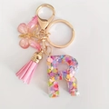 Pink resin letter R keychain with colorful heart sequins, butterfly charm and pink tassel - Letter R
