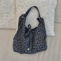 Grey leopard print canvas tote bag with bow detail and gold logo on white fleece - Grey with Ring