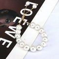 Elegant adjustable freshwater pearl bracelet with golden snake chain and sliding clasp - 10mm