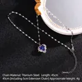 Titanium steel heart necklace featuring a deep blue crystal pendant with silver O-chain - Silver with Blue Heart
